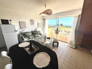 Appartements Les Embruns - Vue Ocean - Terrasse - Plages - GR34 : photos des chambres