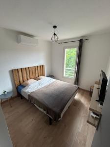 Appartements Maison 4 pers proche du centre : photos des chambres