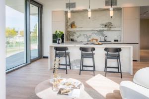 Zatoka Olsztyn Elite4Rent apartamenty z panoramicznym widokiem na jezioro i przestronnymi tarasami