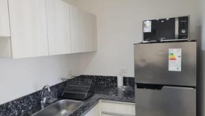 Amplio y luminoso departamento con balcón y parrilla en inmejorable ubicación