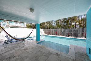 Hidden Treasure Unit B! Modern duplex with shared pool just 200 steps to the beach!