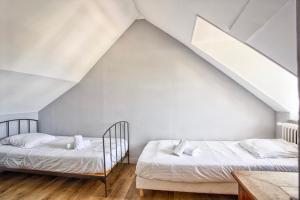 Maisons de vacances Villa 1880 & Belle demeure - Centre ville, Jardin Botanique : photos des chambres