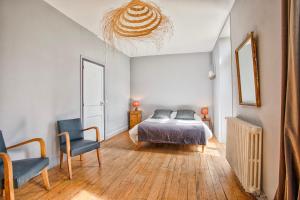 Maisons de vacances Villa 1880 & Belle demeure - Centre ville, Jardin Botanique : photos des chambres