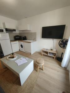 Appartements Le petit coin perigourdin : photos des chambres