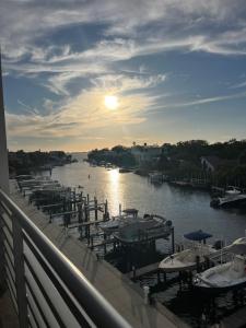 Luxury 2 Bed 2 Bath Waterfront Condo with Patio Sunsets Gym and Parking