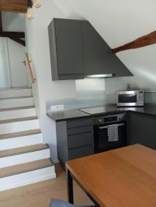 Appartements Les Charmilles : photos des chambres