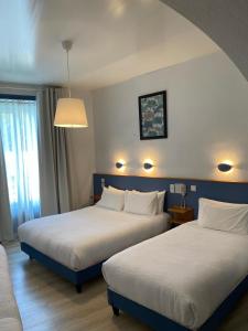 Hotels Logis Hotel Restaurant Grand Hotel de Lyon : photos des chambres