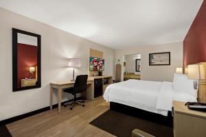 Superior King Room Poolside Smoke Free room in Red Roof Inn PLUS+ & Suites Naples Downtown-5th Ave S
