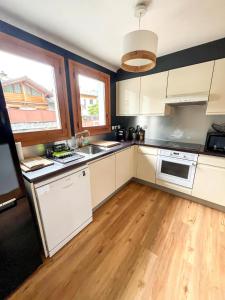 Appartements Nouveau - Duplex avec terrasse et parking 70m : photos des chambres