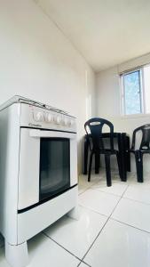 Ap mobiliado proximo ao centro c Ar e Wi-Fi Sem Garagem