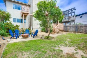 Rooftop patio ocean views surf break steps away