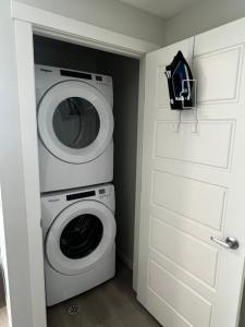 The Oasis-A New 1 bed suite in Livingston Calgary close to the Airport