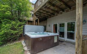 Lake Views! Hot Tub! Walk to Coffee & Lake Rentals