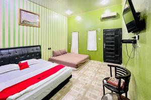 RedDoorz at MCLOS Syariah Guest House Rantau Perapat