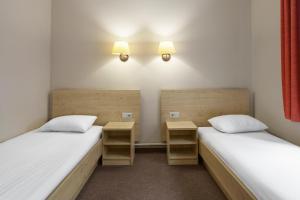 Twin Room with Private External Bathroom room in Rija Domus Hotel