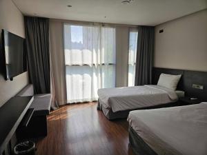 Phòng 3 Người Có Phòng Tắm Riêng (Triple Room with Private Bathroom)