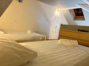 Appartements R-Apparts T3 L-Ecrin Thermal : photos des chambres