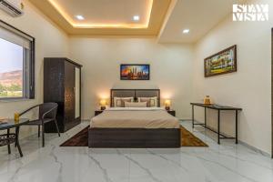 StayVista at Sky Hills with BBQ, Pool