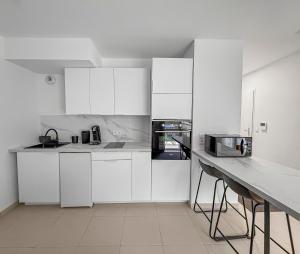 Appartements Studio moderne avec terrasse privee et parking : photos des chambres