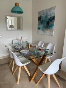 Lets in the Sun -Stunning front line golf apartment