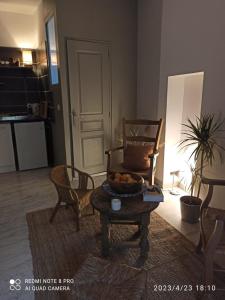 Appartements Les volets bleus : photos des chambres
