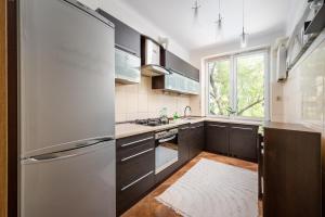 Rondo Wiatraczna Stylish Apartment by BookingHost