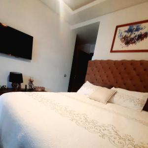 Appartement vue piscine à 3min de la plage bouznika