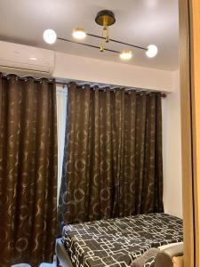 Shell Residences MOA by Kirstie