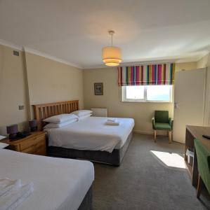Twin Room with Sea View room in The White Rock Hotel