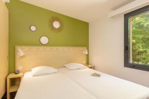 Villages vacances Center Parcs Les Trois Forets : photos des chambres