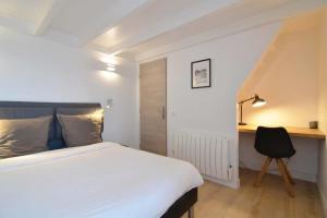 Appartements Luis Mariano Triplex Apartment : photos des chambres
