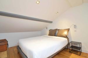 Appartements Luis Mariano Triplex Apartment : photos des chambres