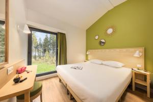 Villages vacances Center Parcs Les Trois Forets : photos des chambres