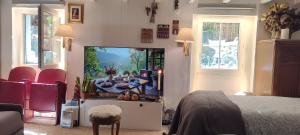 Sejours chez l'habitant PARIS AUTHENTIC HOUSE Metro 14 Station Hopital Bicetre, RER B Gentilly : photos des chambres