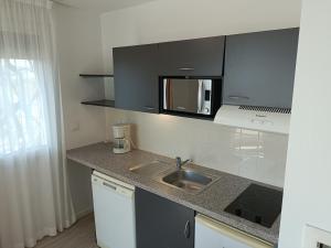 Appartements Terres de France - Appart Hotel Rouen Flaubert : Studio