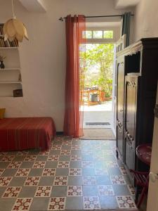 Maisons de vacances La Maison Rose I Maison de village familiale : photos des chambres