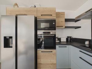 Chalets Chalet neuf pour 6 avec piscine chauffee a l-annee : photos des chambres