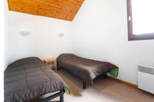 Appartements Appartement vue sur les pistes, pour 8 : photos des chambres