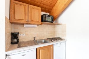 Appartements Appartement vue sur les pistes, pour 8 : photos des chambres