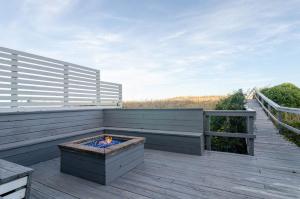 Shore to Relax Lower by Bryant Real Estate