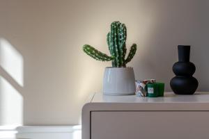 Classic Meets Modern – Downtown Balcony Retreat