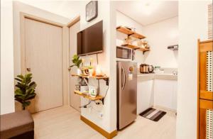 2 BR condo trees residences Netflix Games karaoke