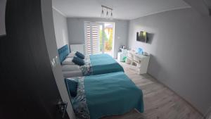 Bryant - Pokoje & Apartamenty