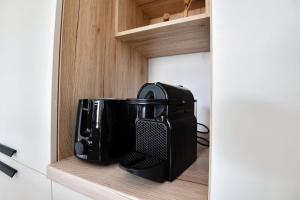 Appart 1 ch avec balcon et parking à la Joliette