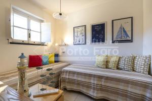 3 Centro - Bilocale con terrazza vista mare Porto Faro