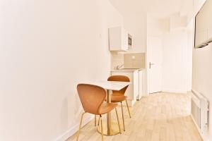 Appartements Cozy and convenient studio in Asnieres-sur-Seine-II : photos des chambres
