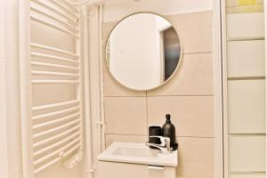 Appartements Cozy and convenient studio in Asnieres-sur-Seine-II : photos des chambres