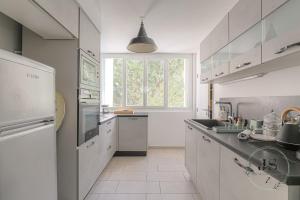 Appartements L-Escapade Stadium - T4 familial climatise : photos des chambres