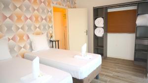 Appartements ODI RENT - Le 60 : photos des chambres