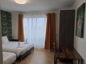 Appartements ODI RENT - Le 60 : photos des chambres